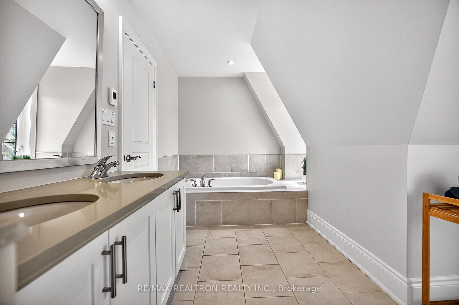 Frameless Glass Shower + Stone Countertops