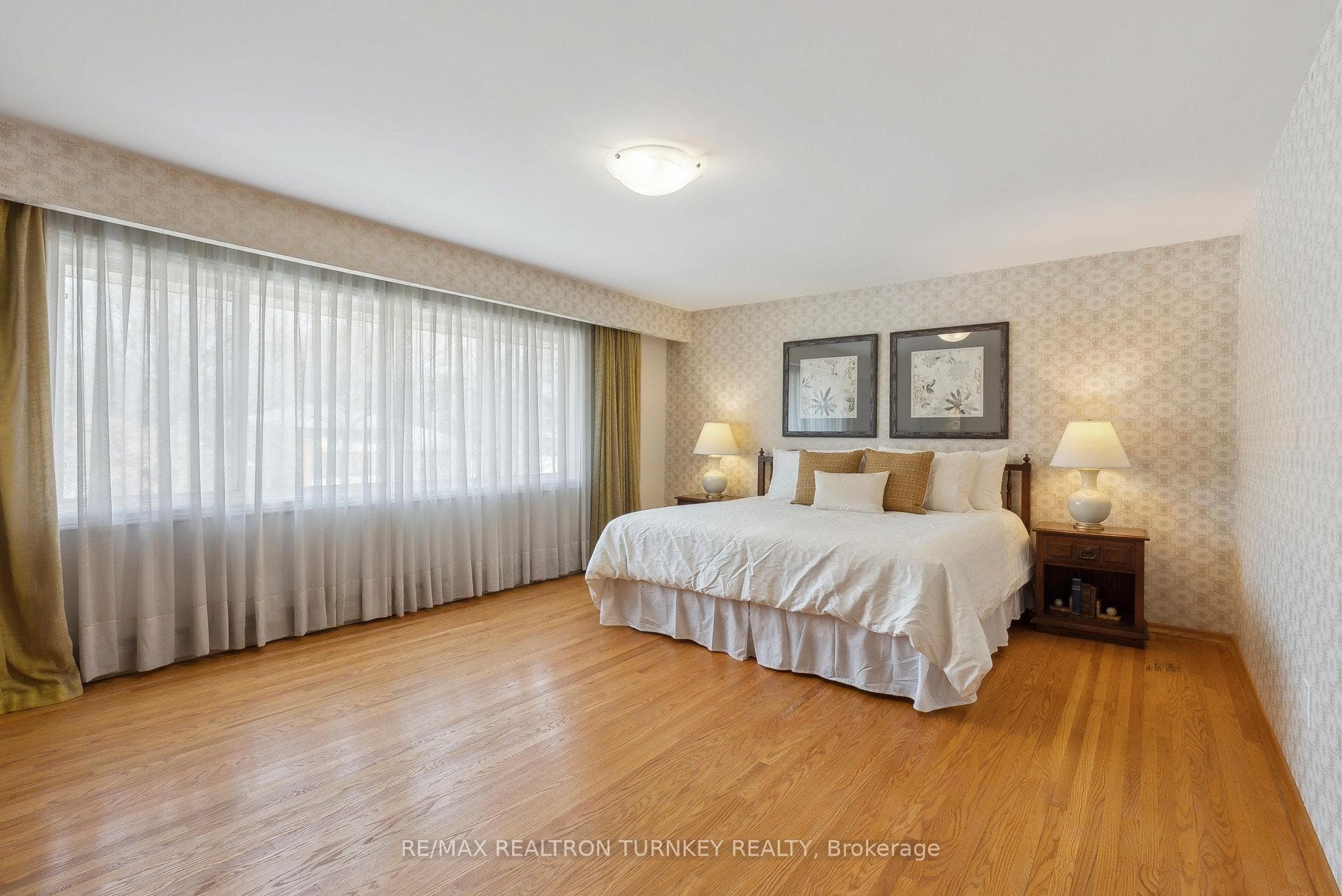 Spacious Primary Bedroom w Hardwood & Huge Window!