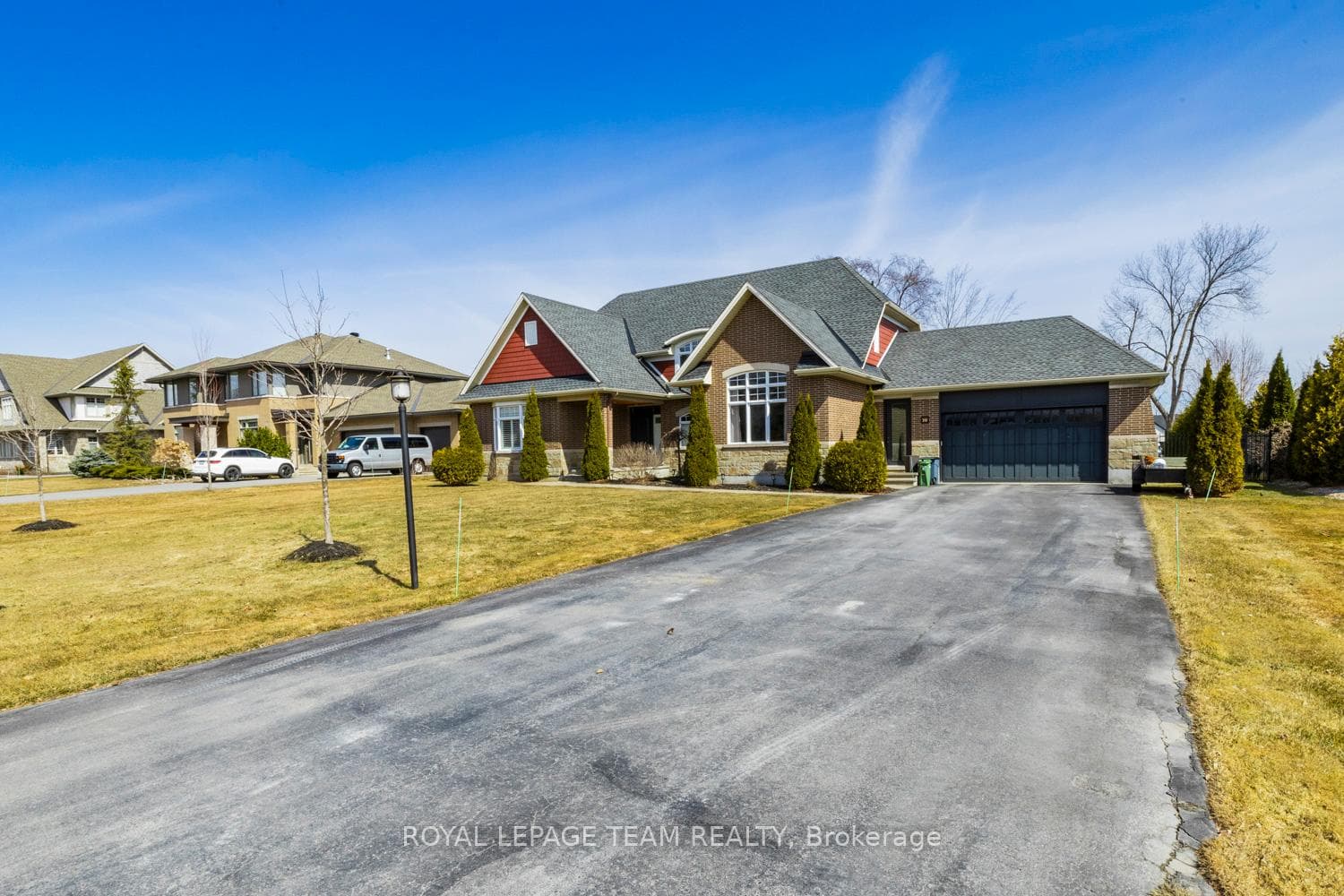 Beautiful front exterior with red gable detail