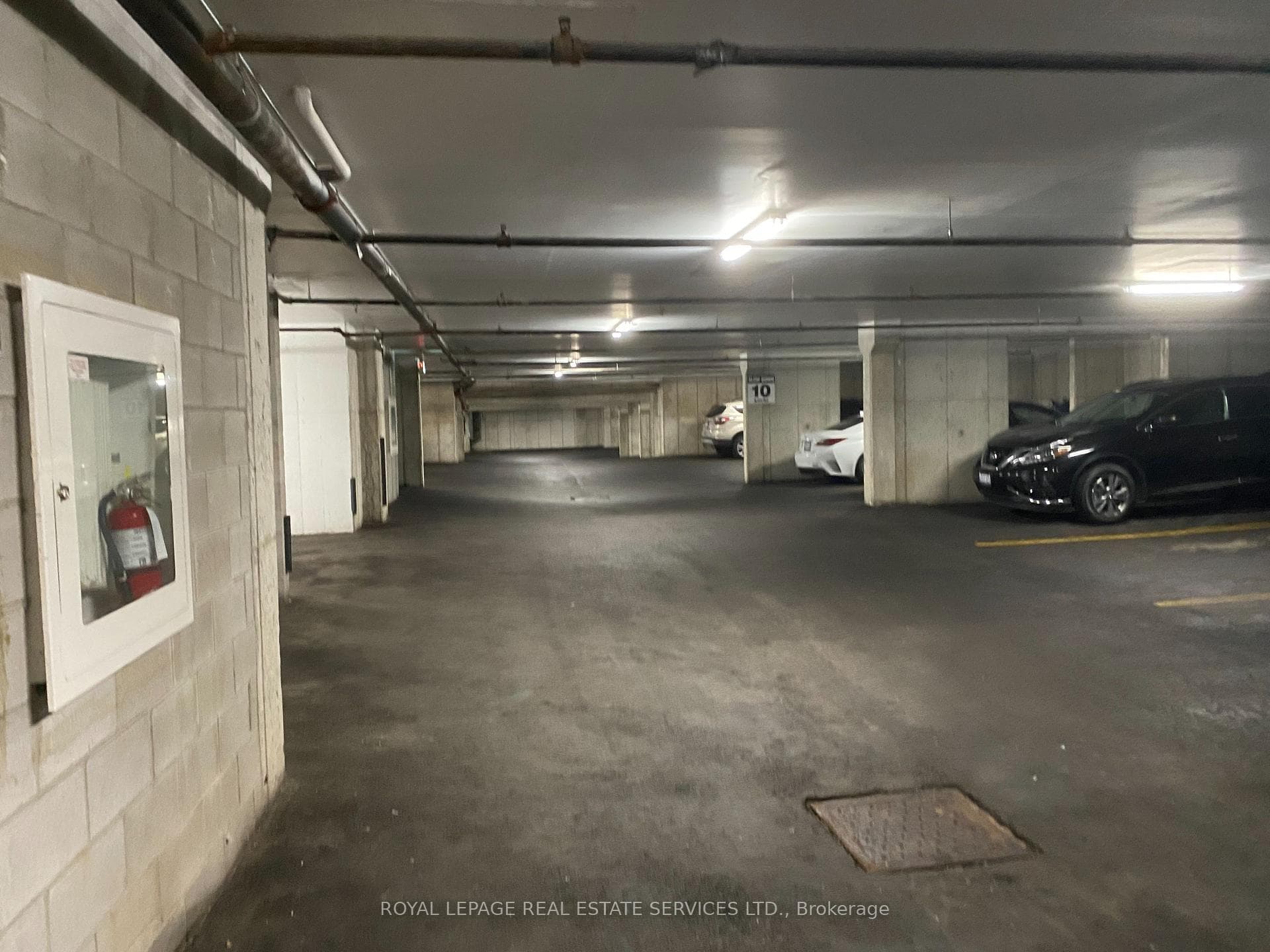 parkade with one of 2 parking spaces