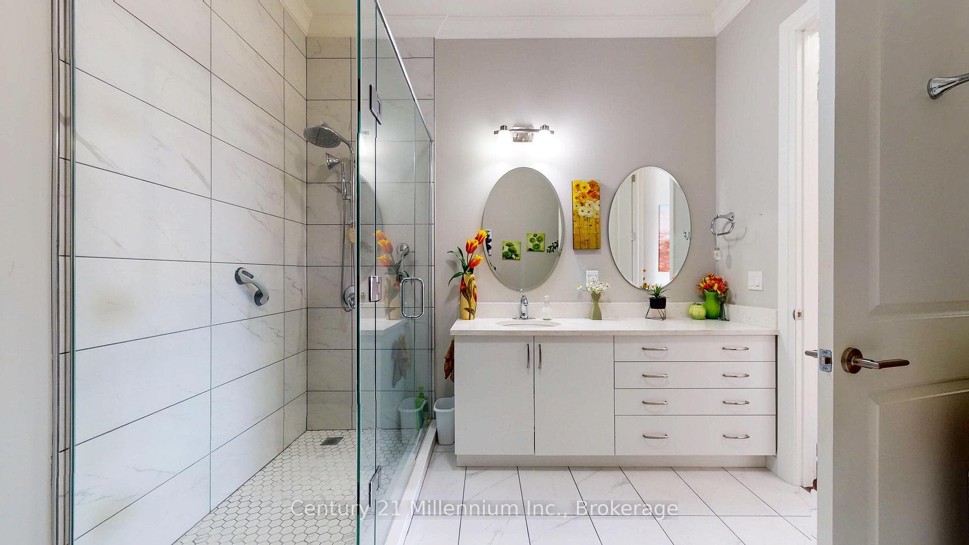 Large ensuite vanity with multiple storage drawers