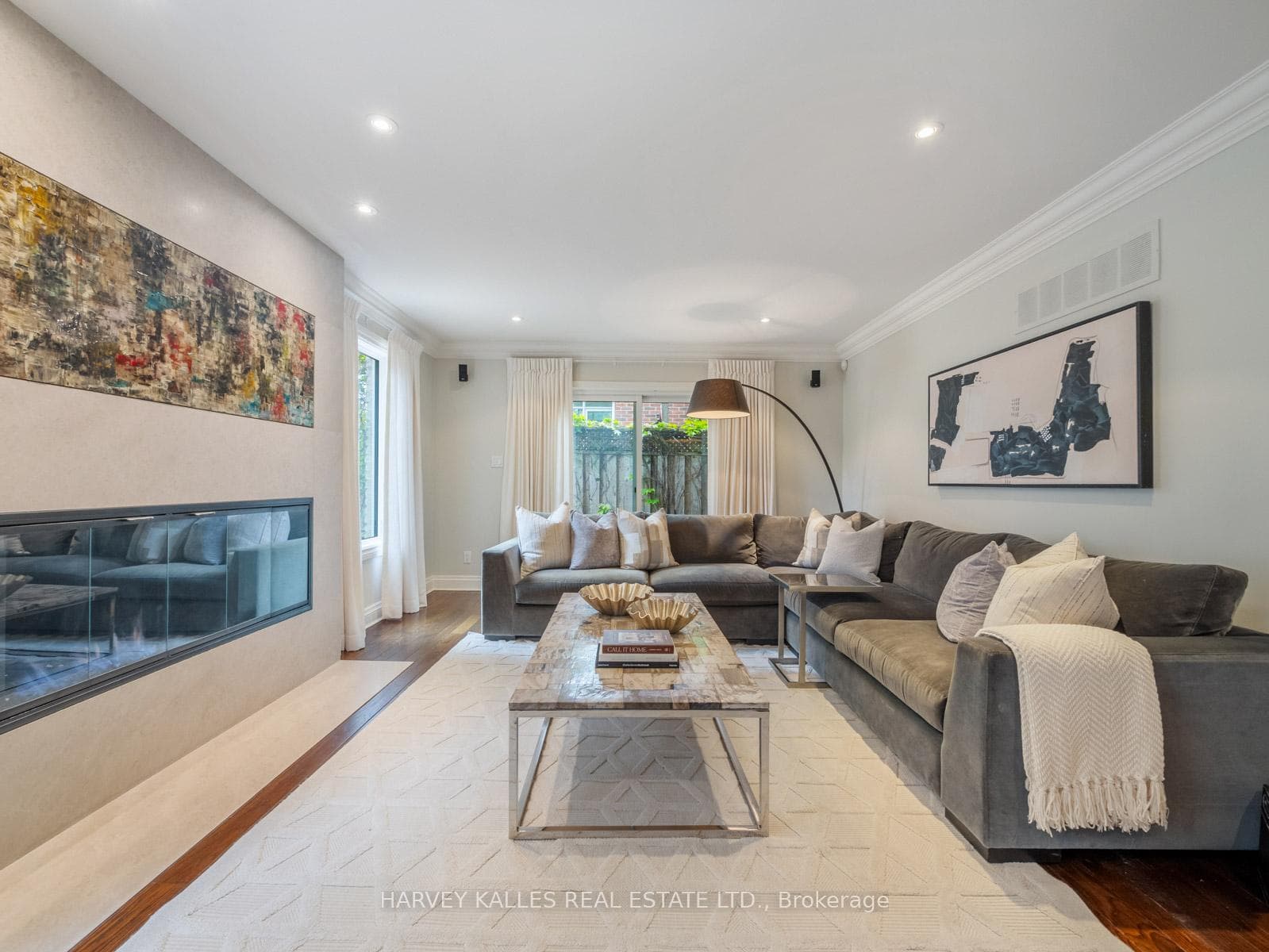 Living Room with Walkout and Fireplace