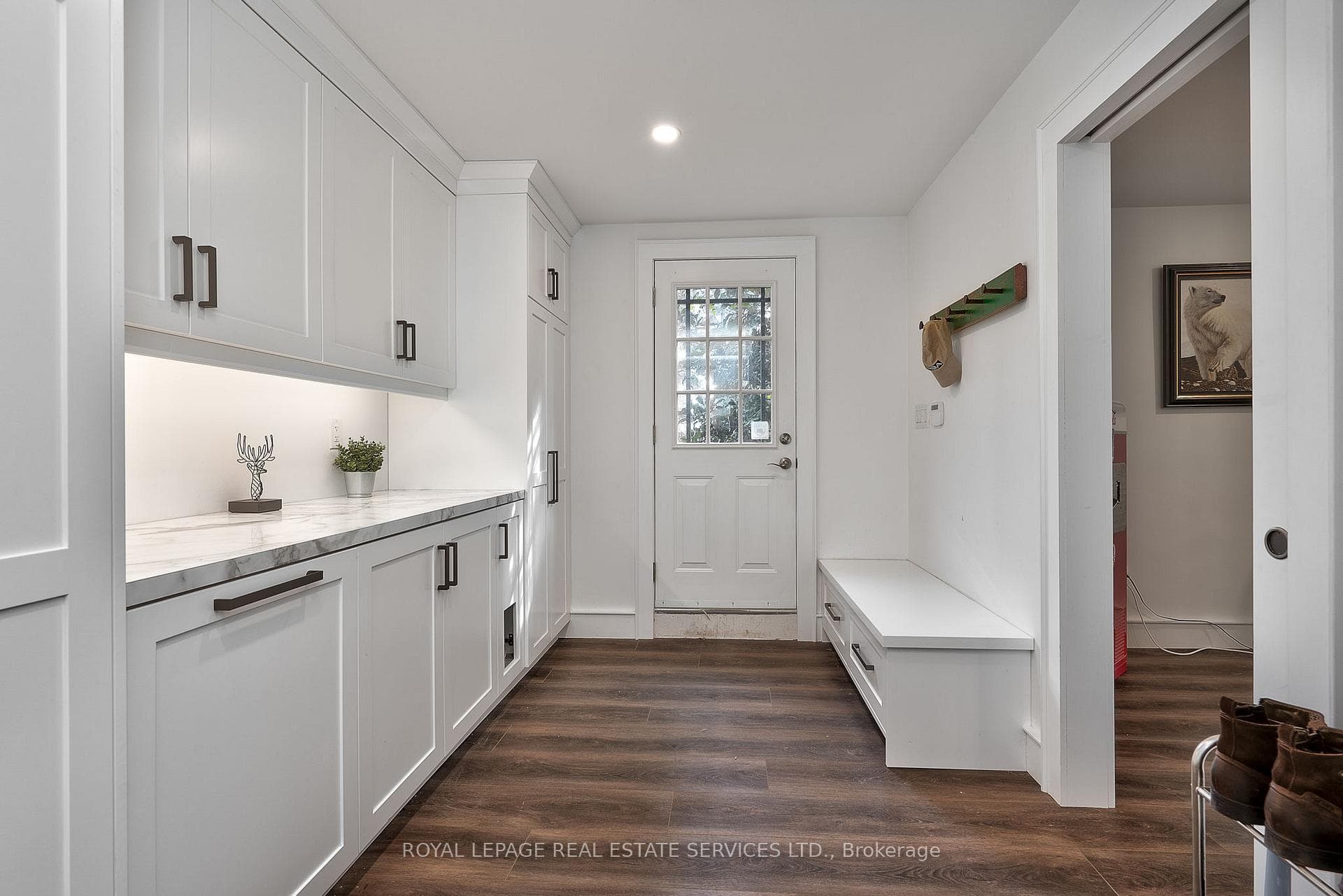 Mudroom with Access to the Garage and Back Yard