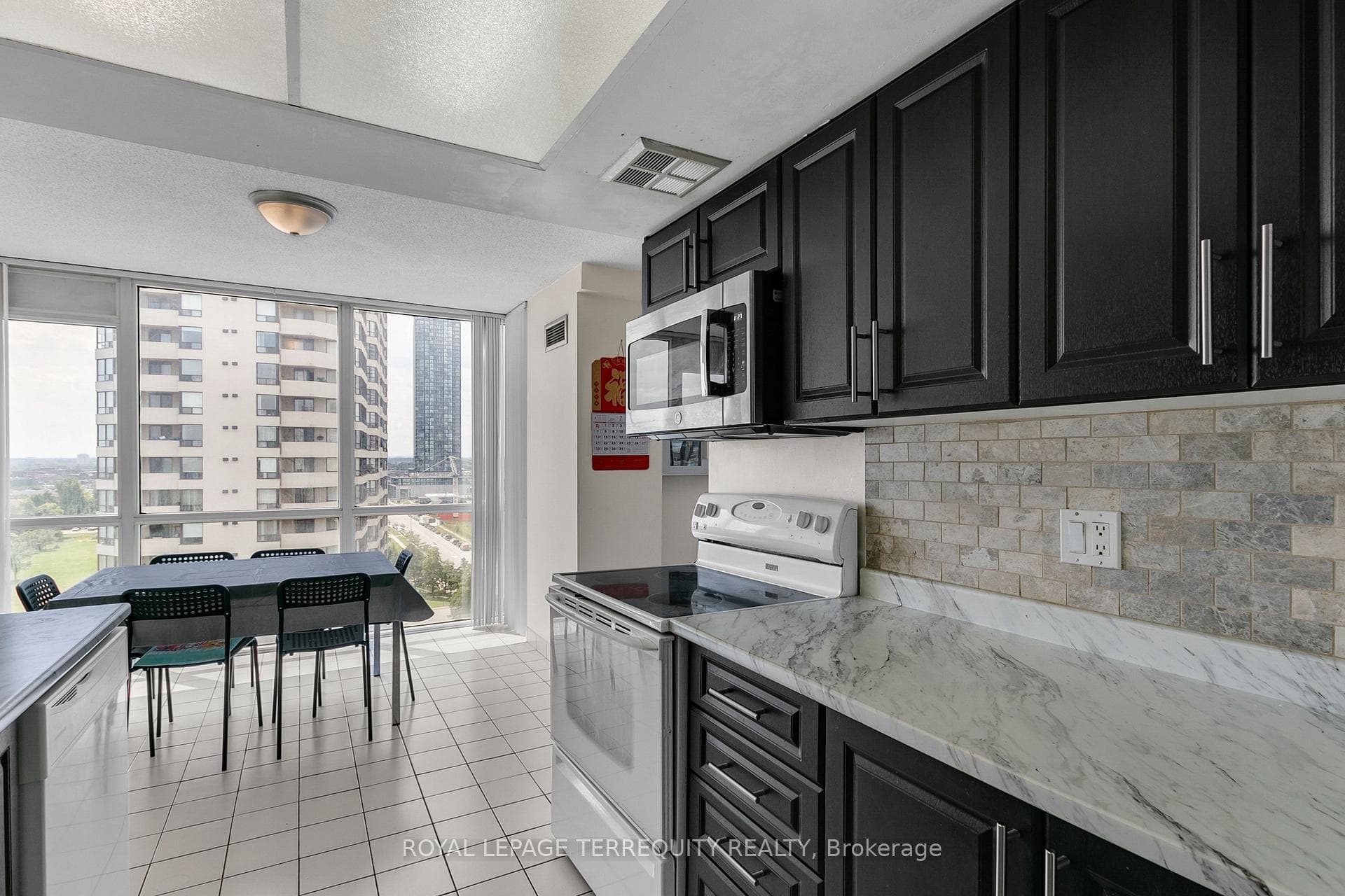 Custom Backsplash and Renovated Cabinets