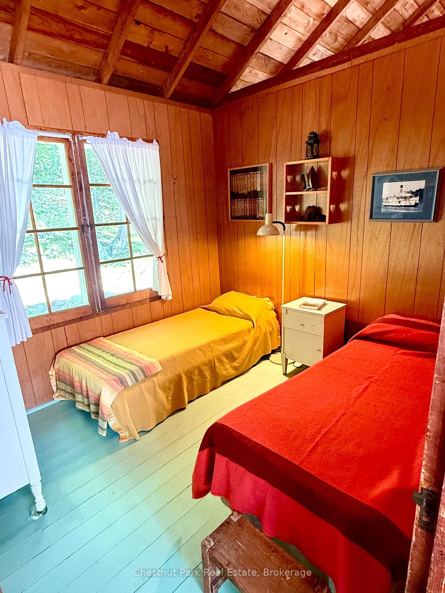 Twin beds and armoire in 2nd beroom