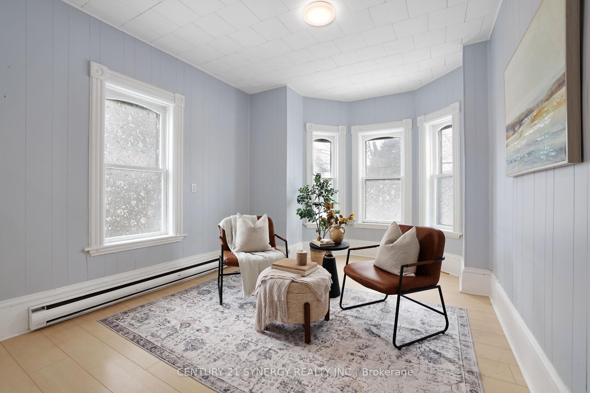 Unit 2: living room with tons of natural light.