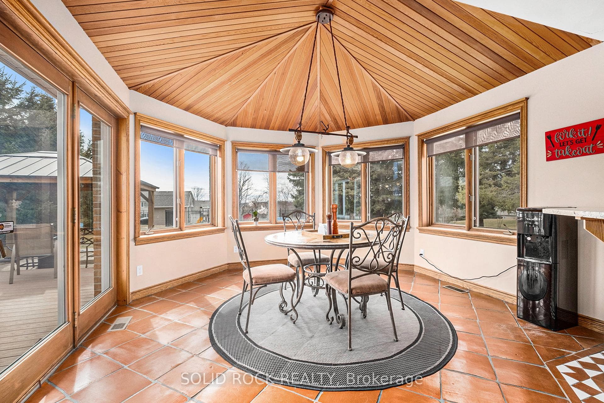 Breakfast nook with open view of backyard