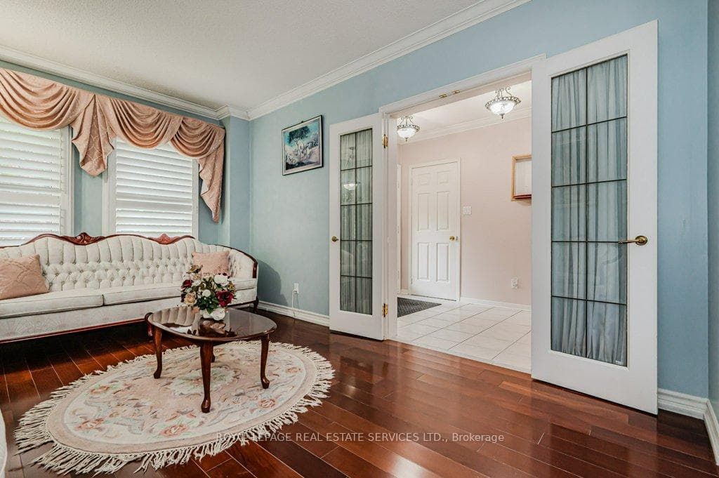 Living Room w/French Doors and Hardwood Flooring