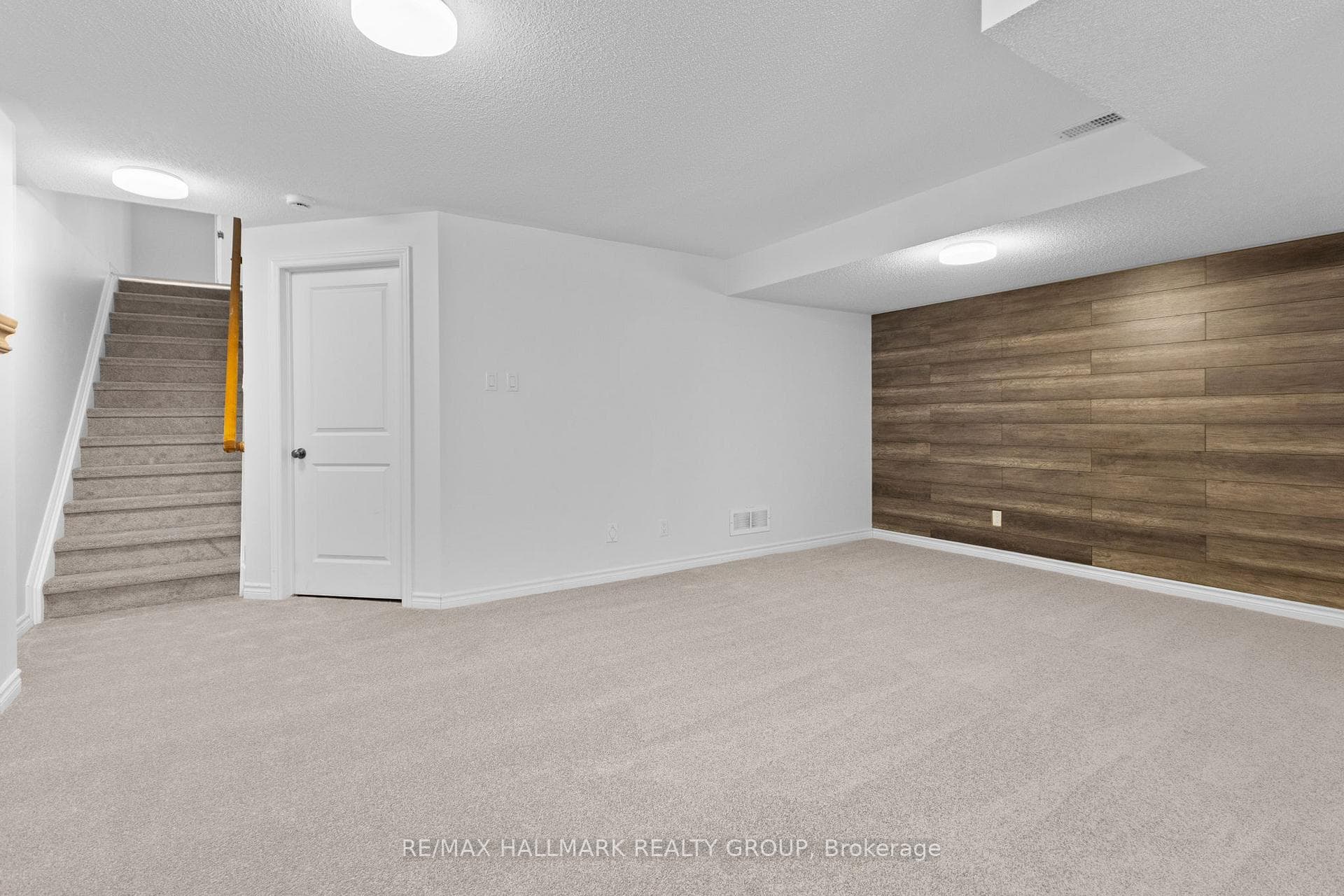 Finished basement with carpet flooring