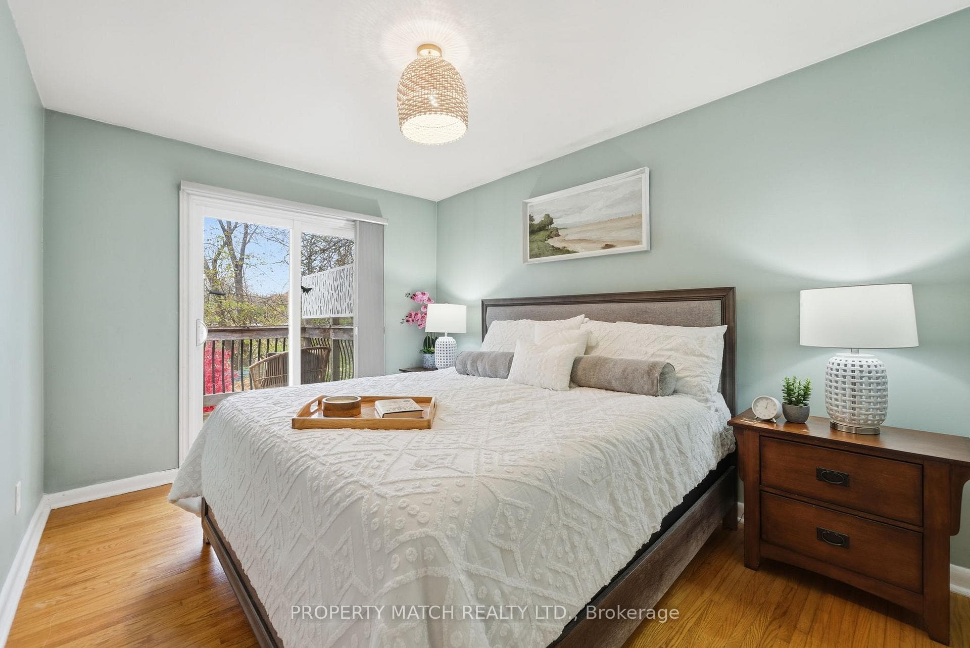 primary bedroom with walkout to deck