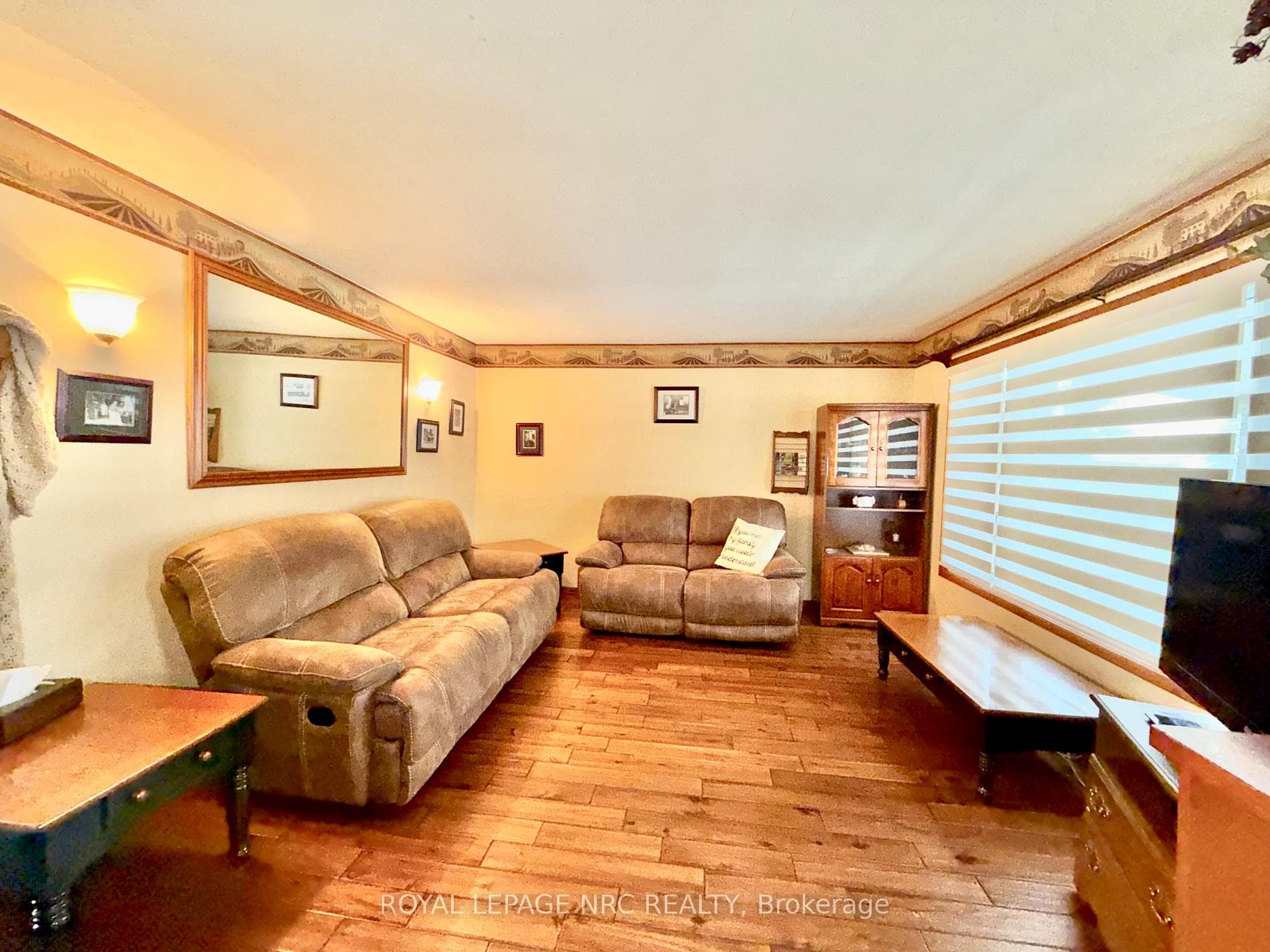 large main floor living room - newer laminate