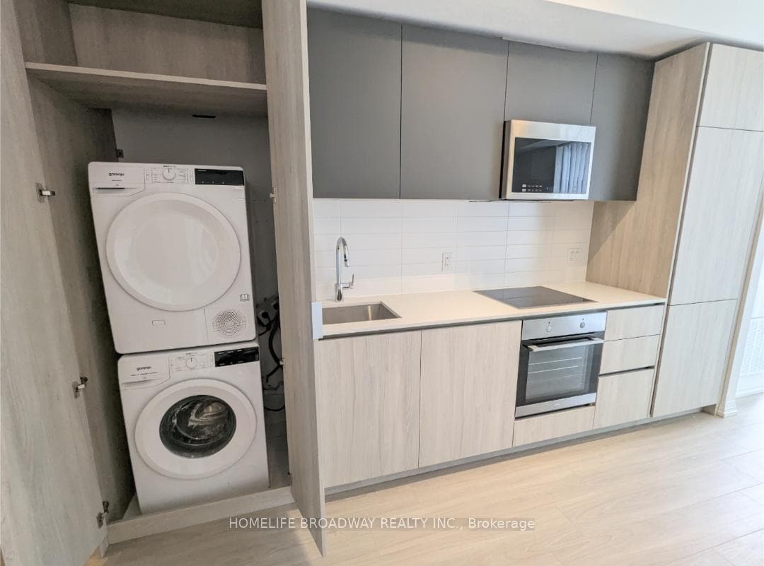 Front load washer/dryer and kitchen