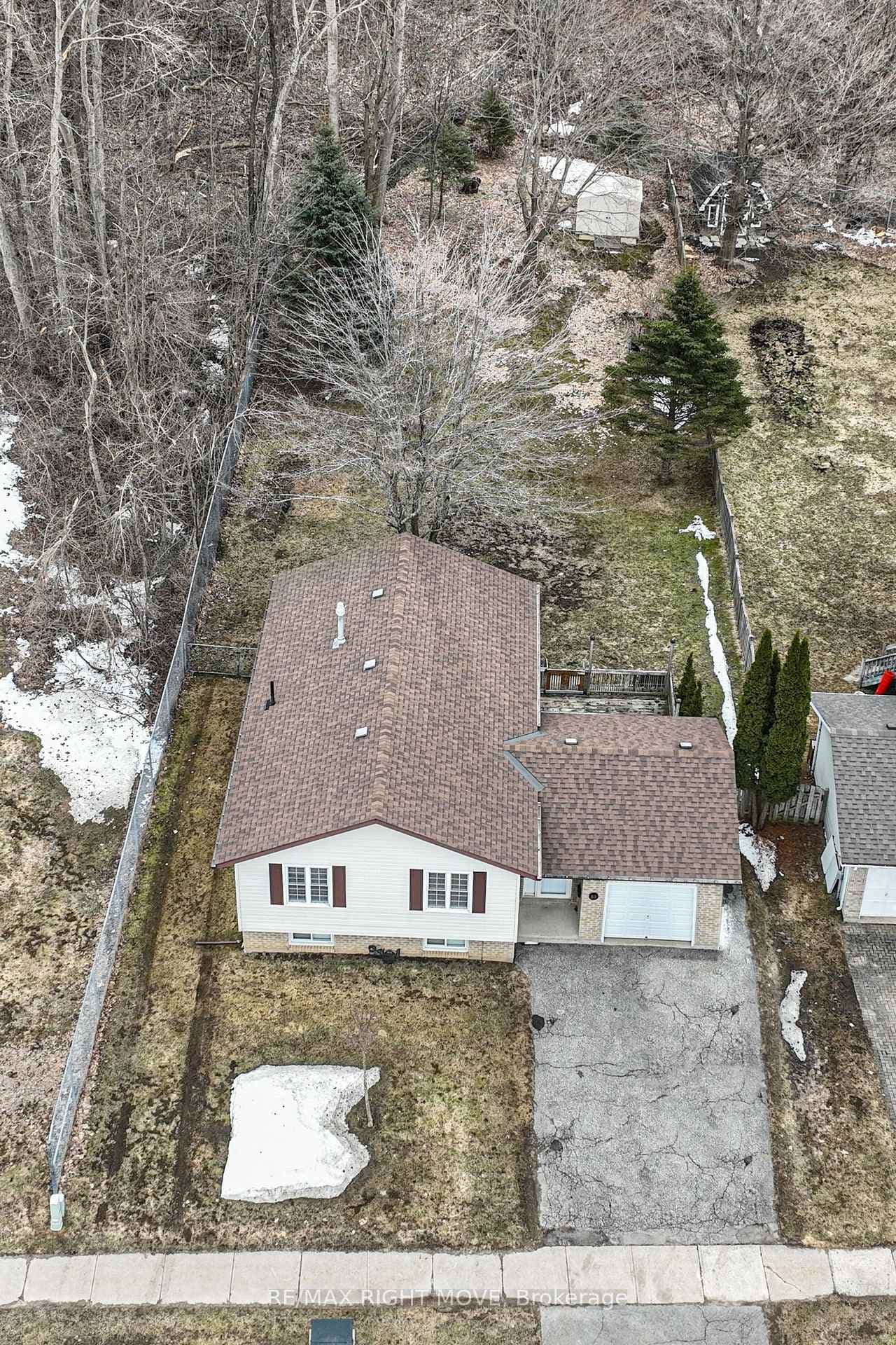 Overview of property including attached garage