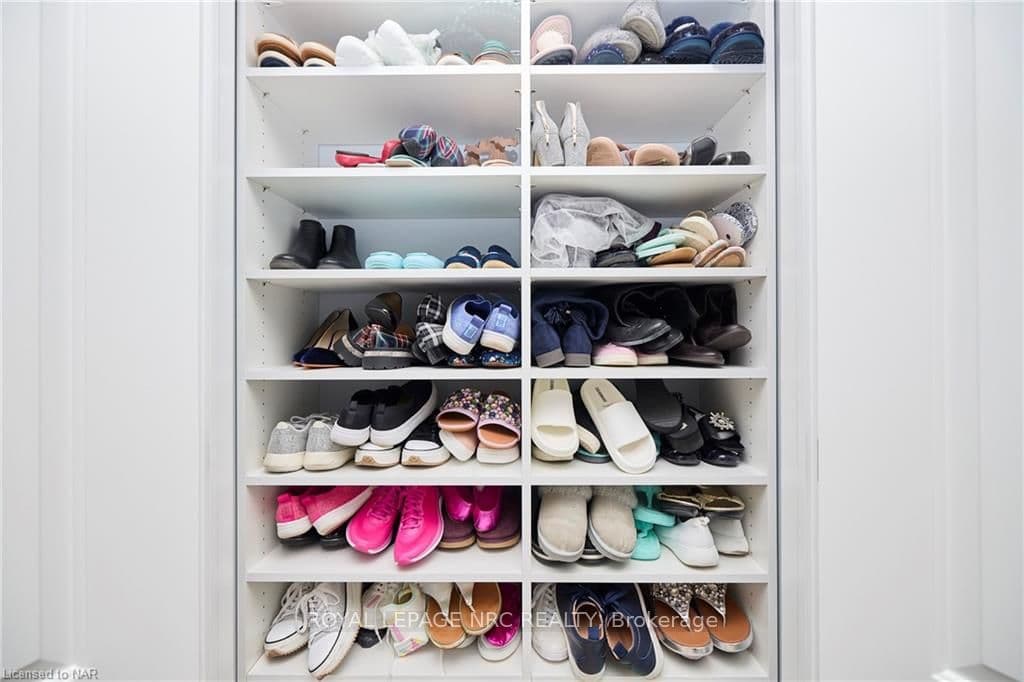 Additional shoe closet in primary bedroom