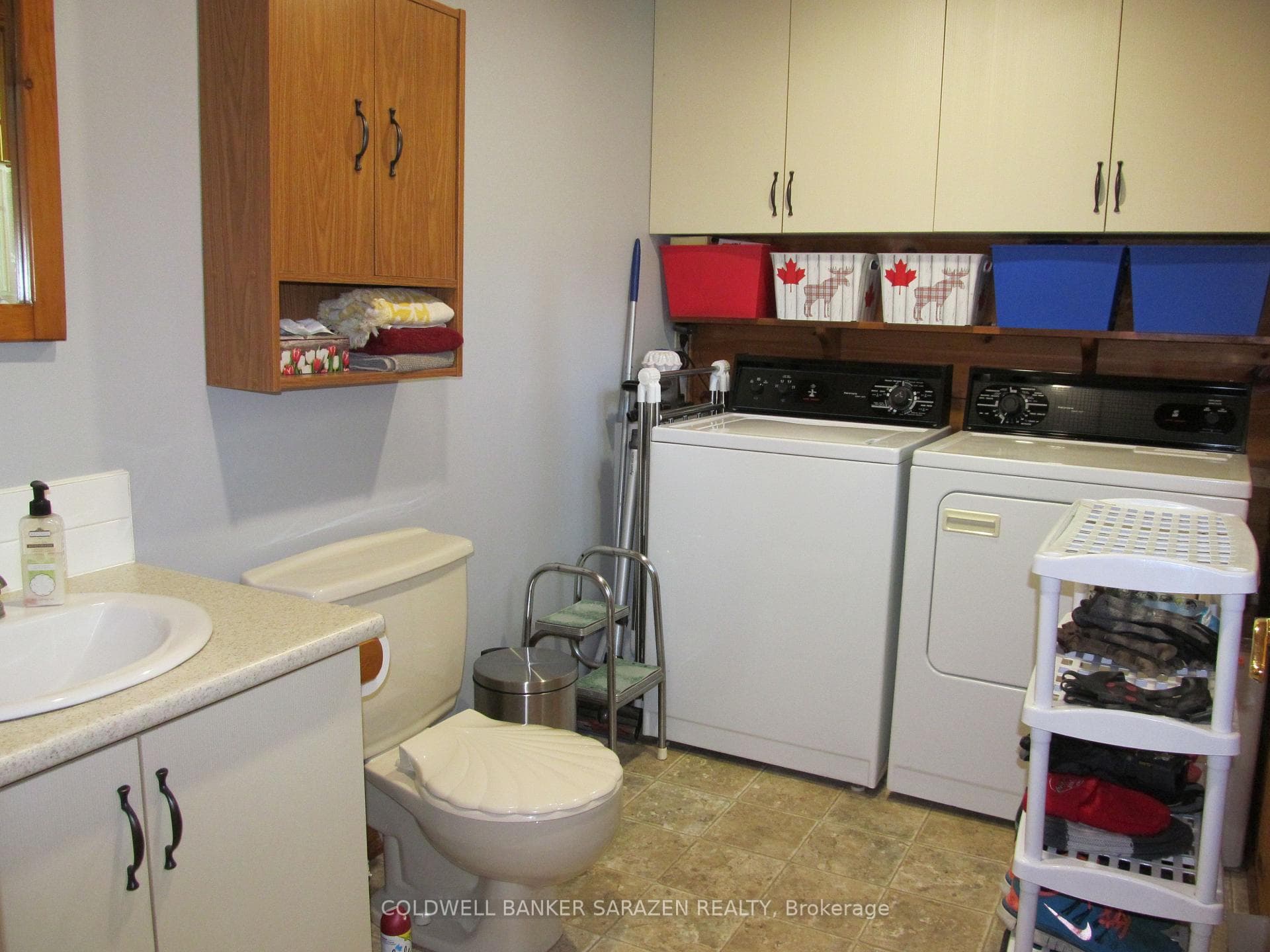 Two piece bath together with launddry & storage.