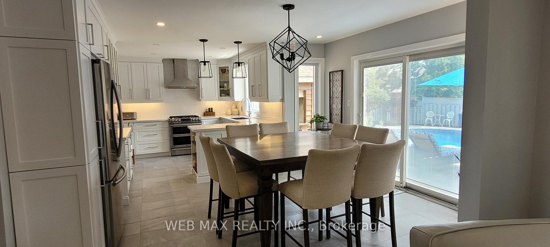 large size kitchen overlooks pool thru new sliders