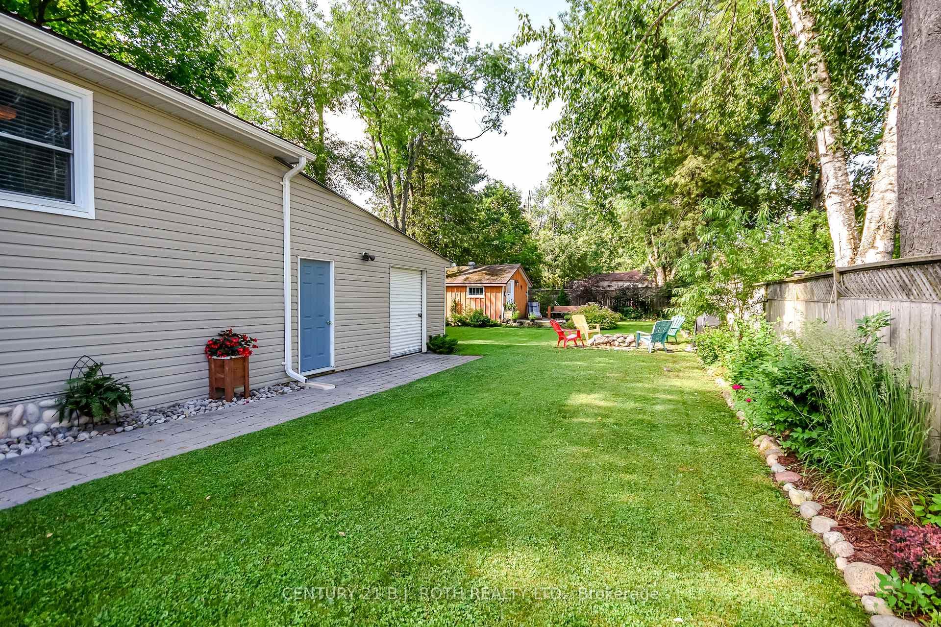 Fully fenced backyard with irrigation system