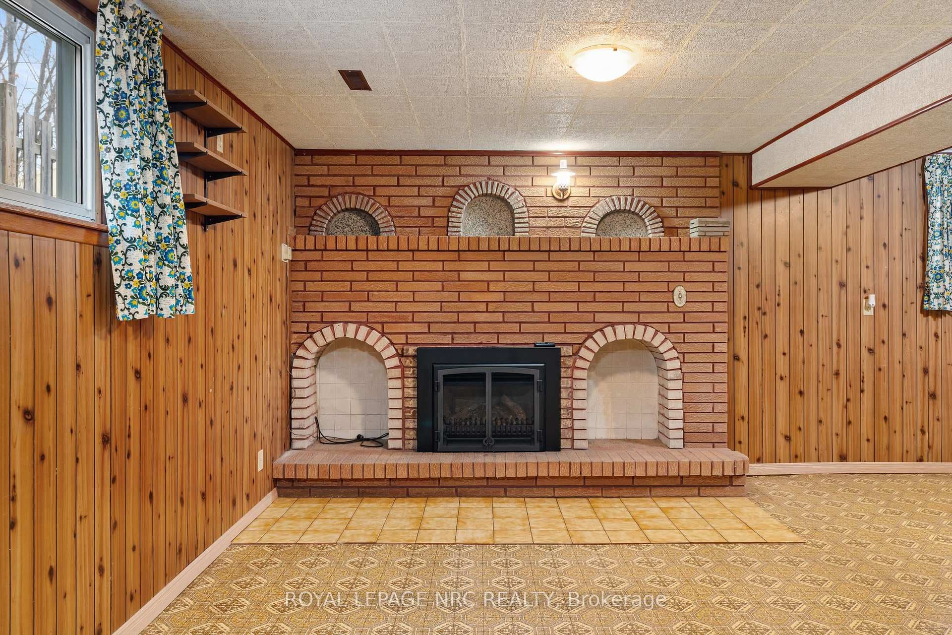 rec room with gas fireplace