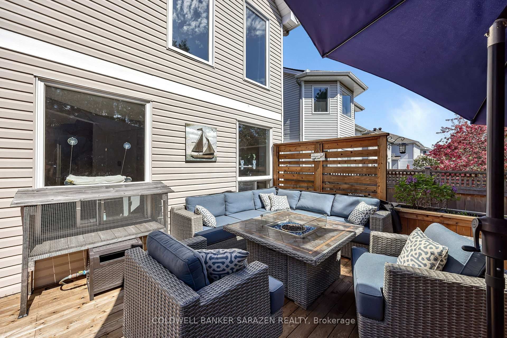 Large deck with seating area & privacy screens
