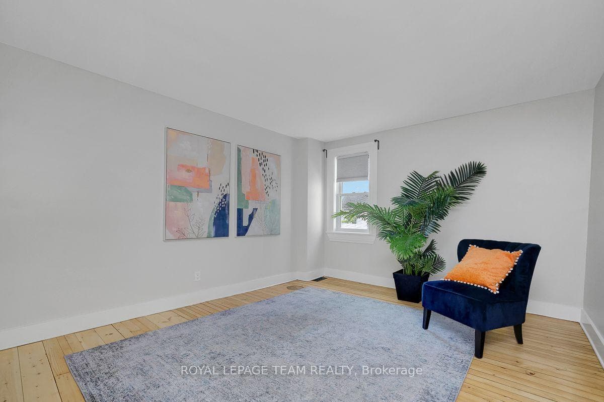 Large primary bedroom overlooks the backyard.