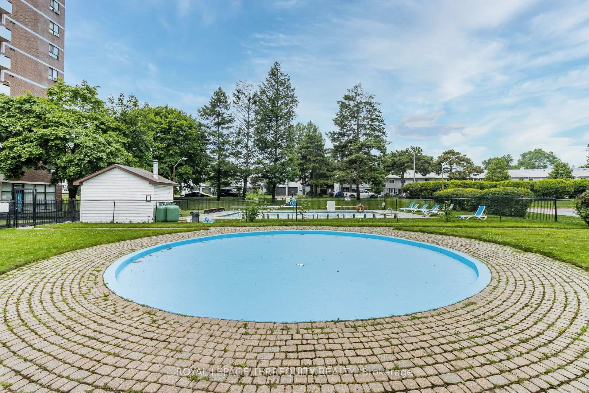Splash Pad & Outdoor Pool (at back of Photo)