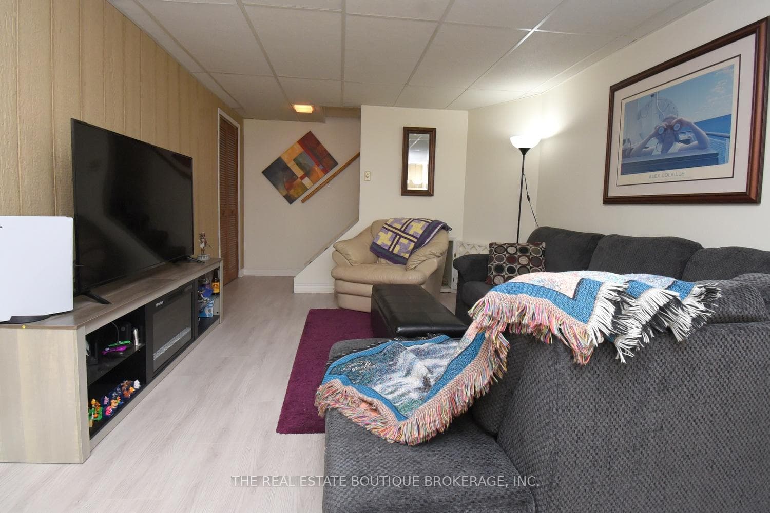 Large Recreation Room with Hardwood like flooring