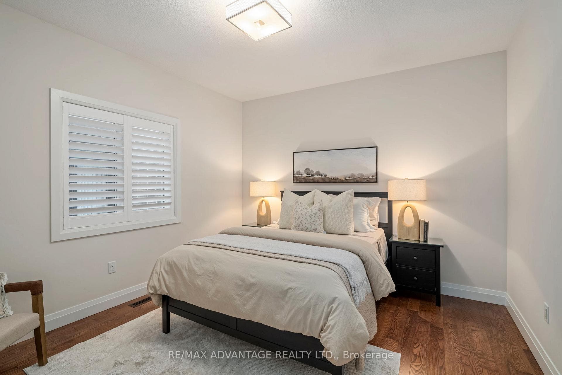Bedroom 2 - hardwood floors & california shutter