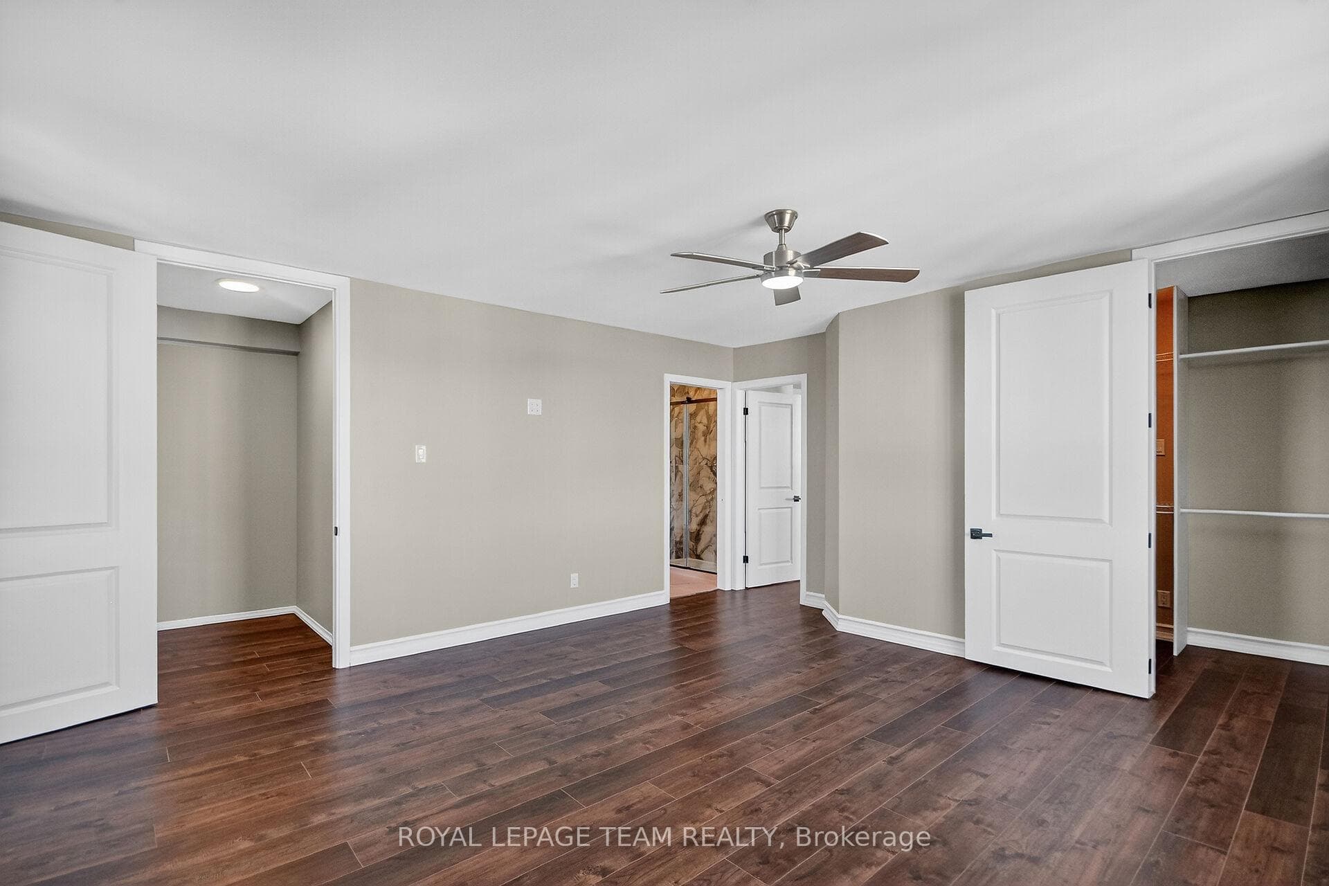 Primary bed storage closet & large walk-in closet