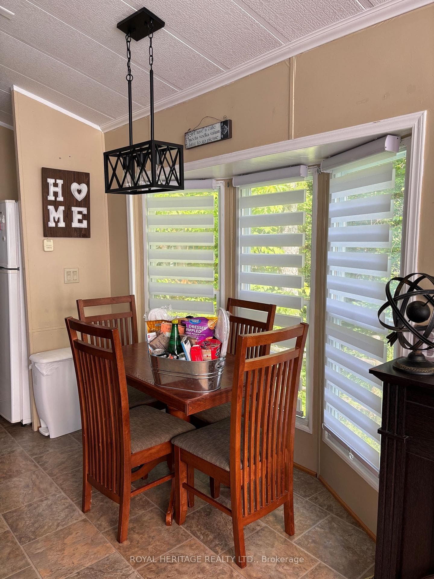**Dining Area With Floor-To-Ceiling Windows**