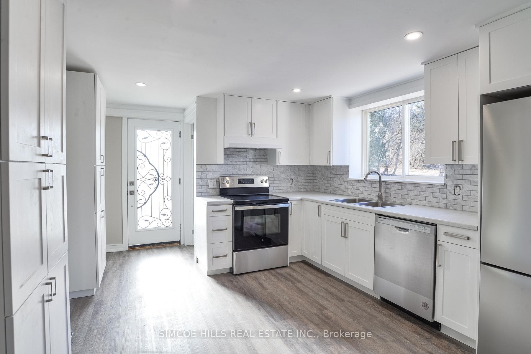 Kitchen with walk out to back yard