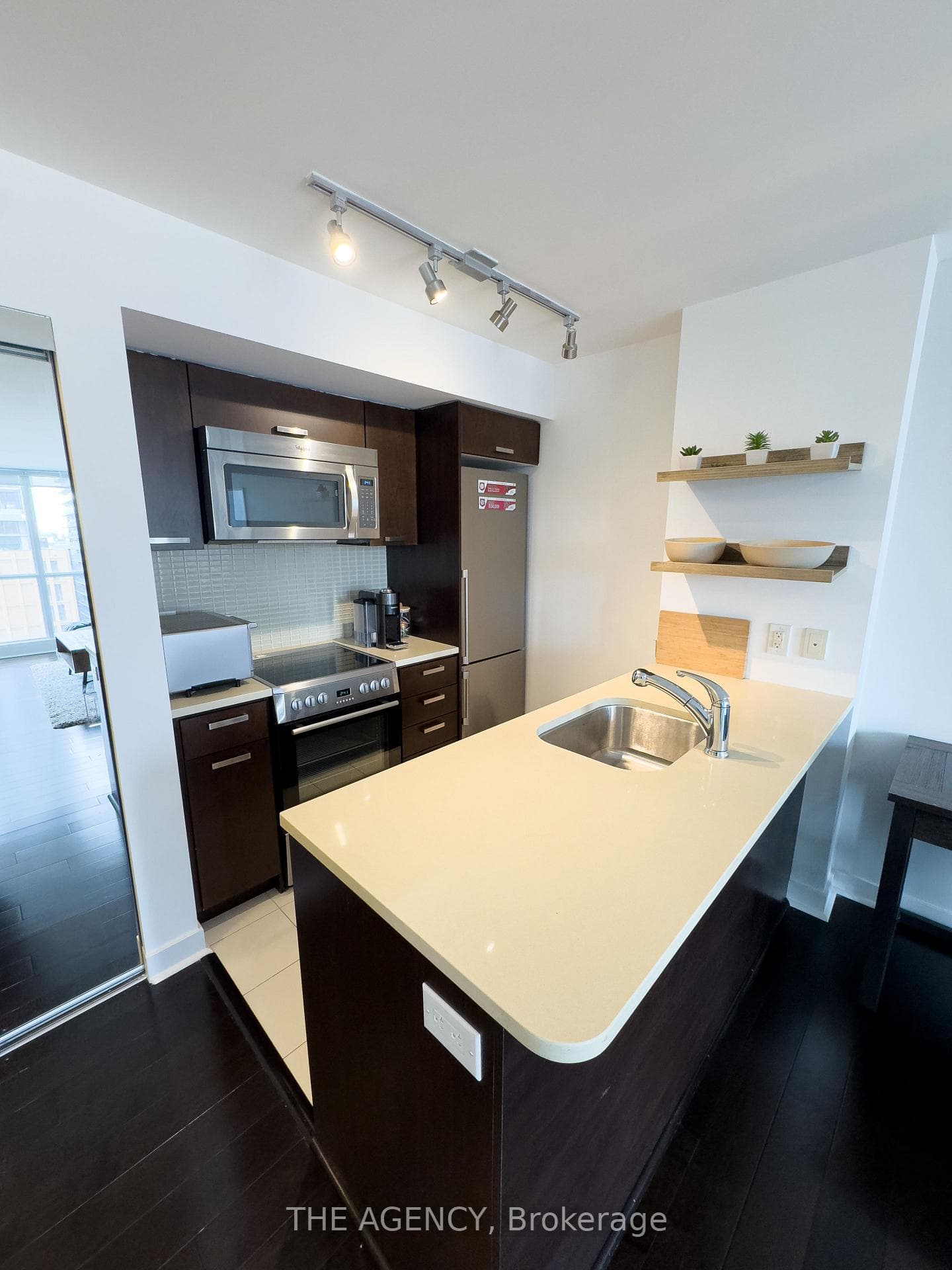 Kitchen with stainless steel appliances