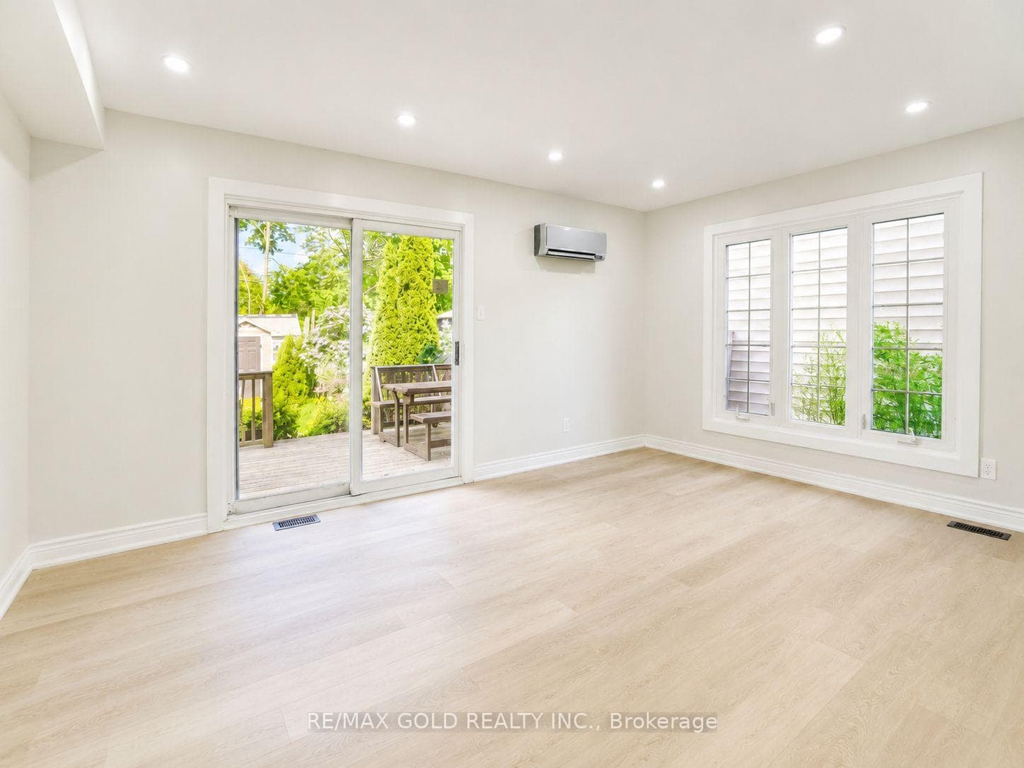 Spacious renovated living room with pot lights