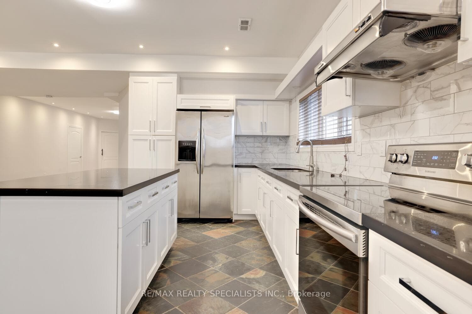 Granite Countertops, Marble backsplash.