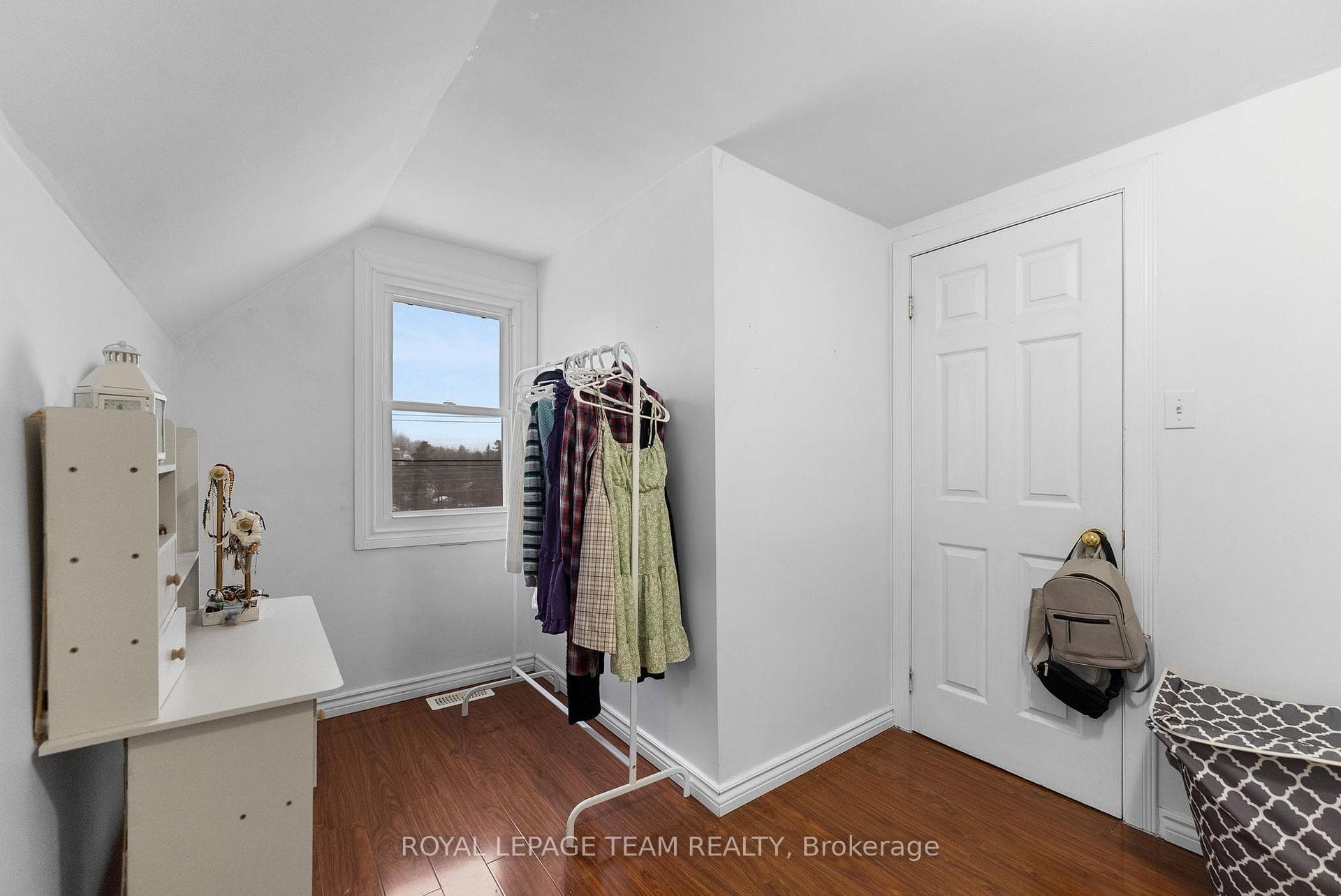 Bedroom adjacent to main bath - faces road