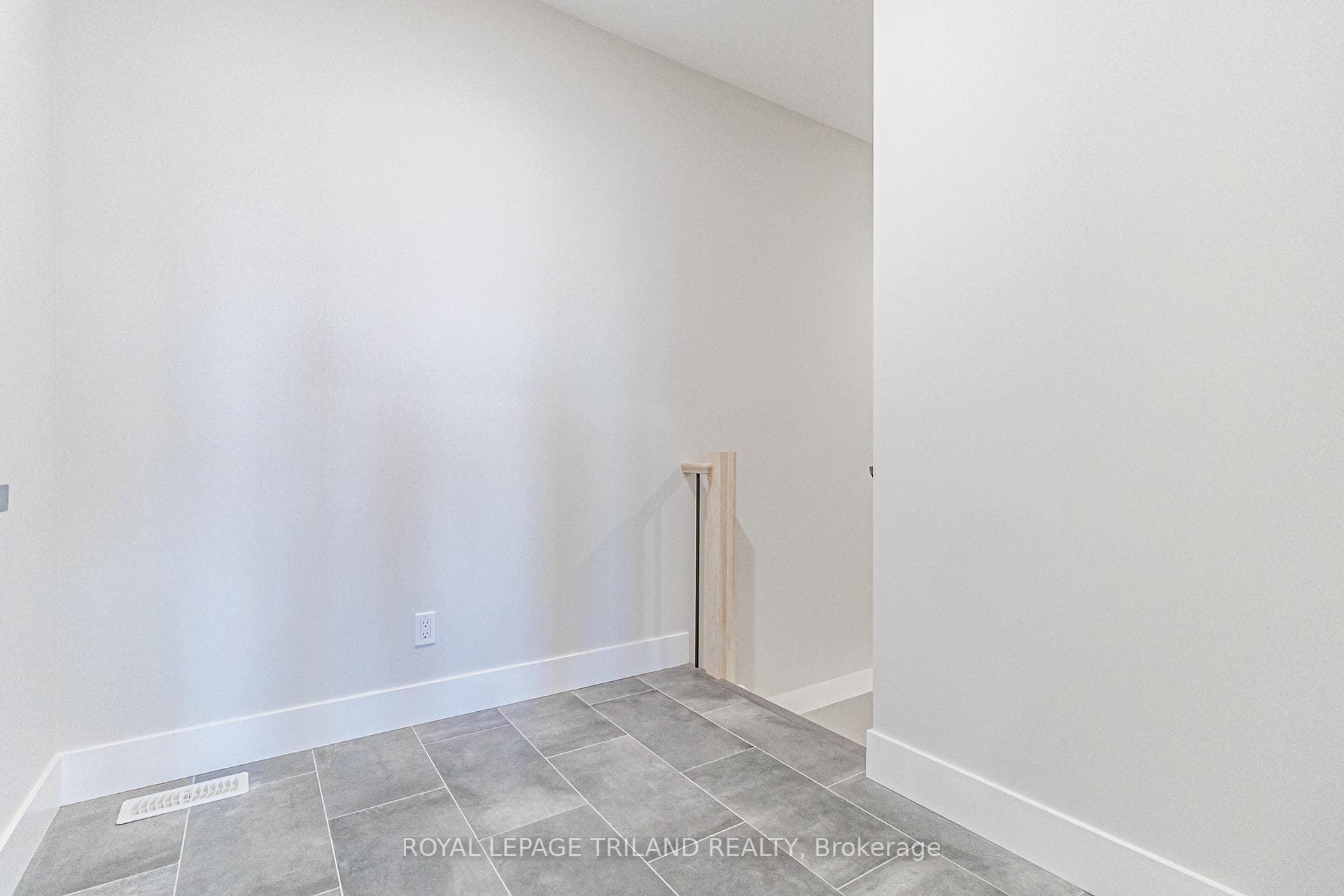 Mid-level mudroom opposite garage entry