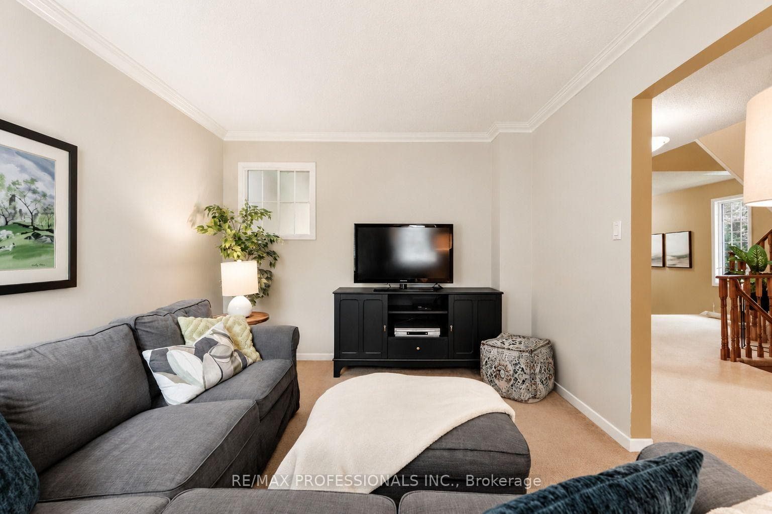 Main Floor Family Rm with Windows & Crown Moulding