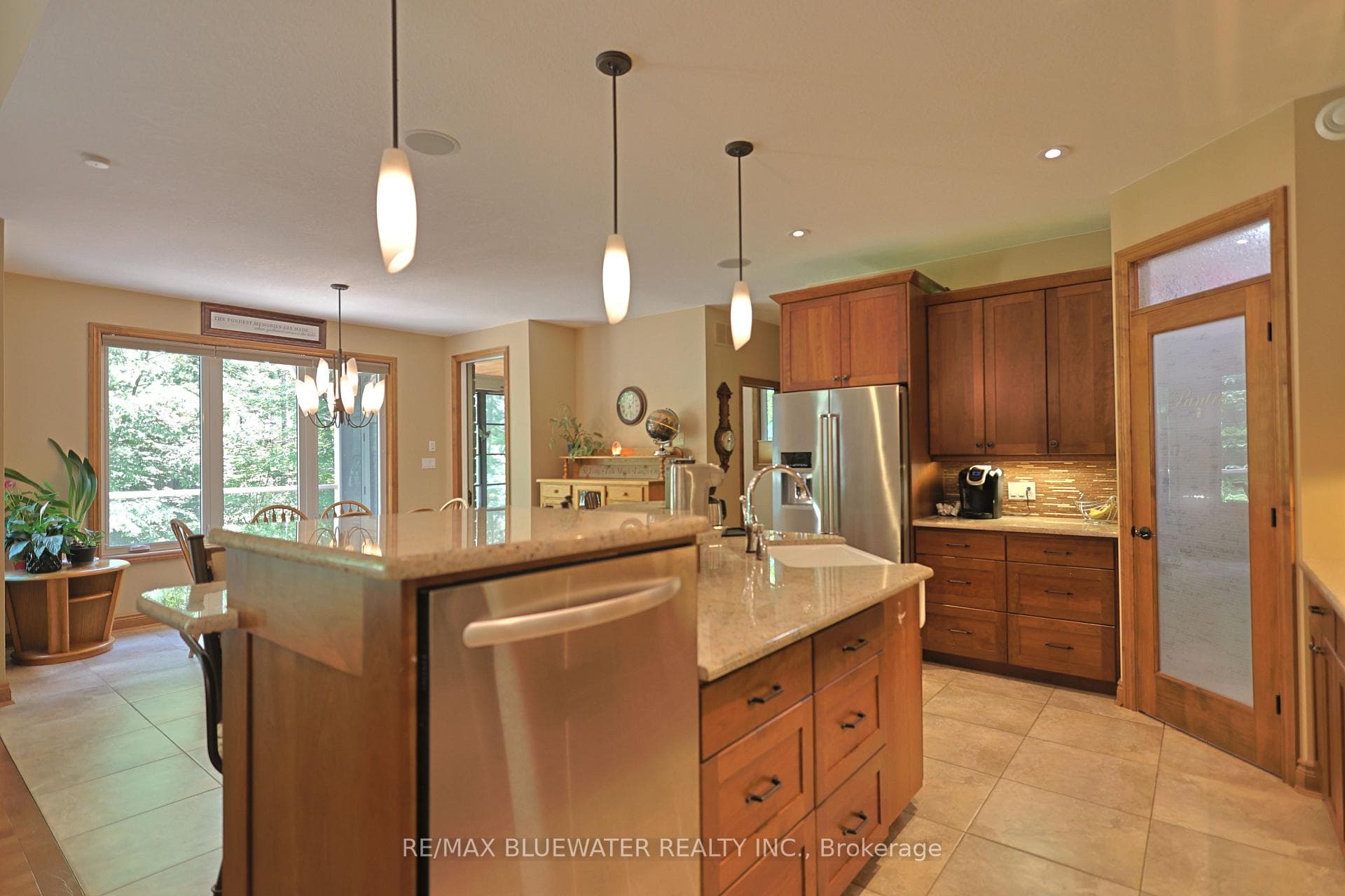 Island with Granite Countertops, Pendant Lighting