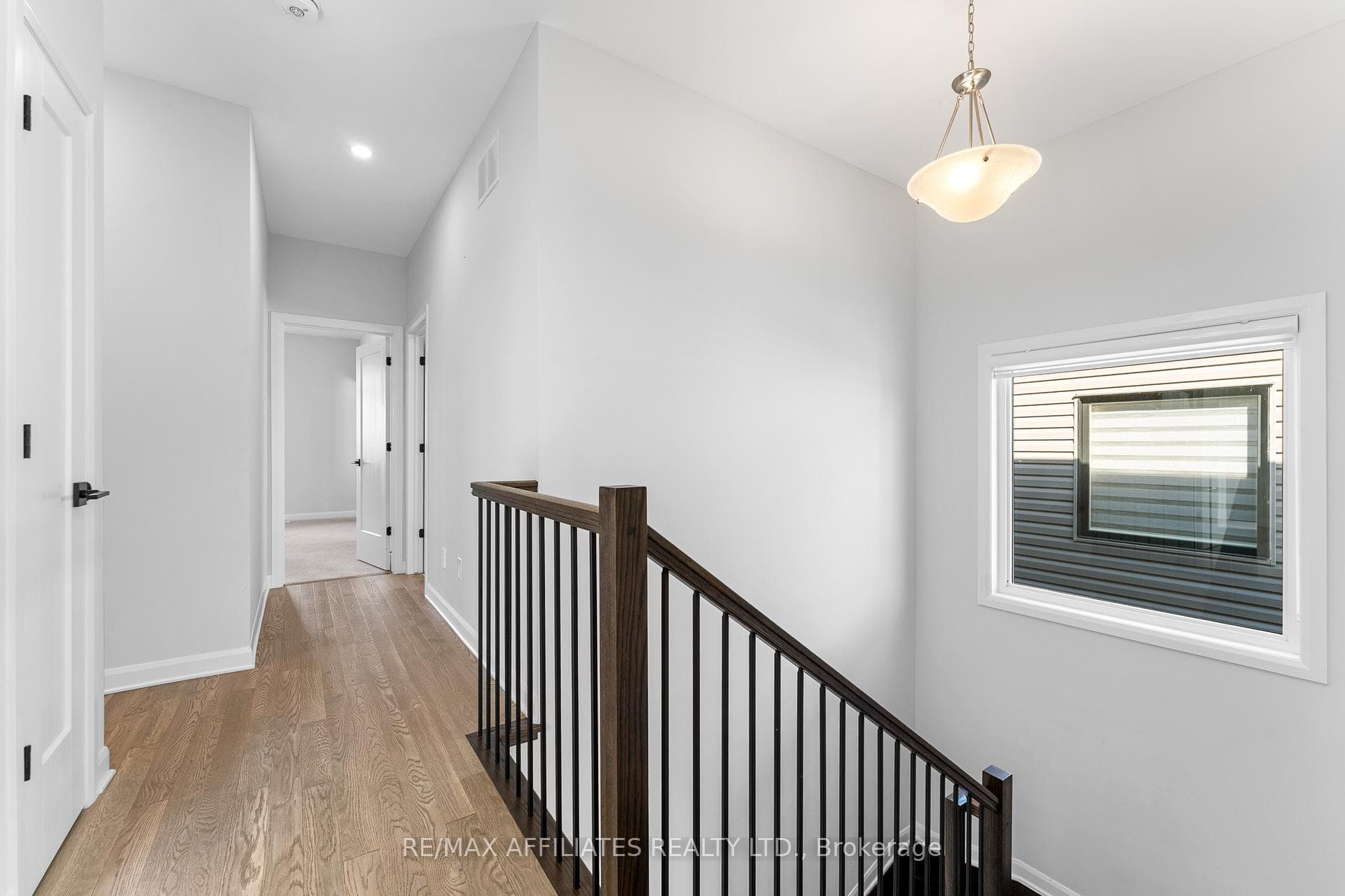 2nd Level Hallway w/Large Window