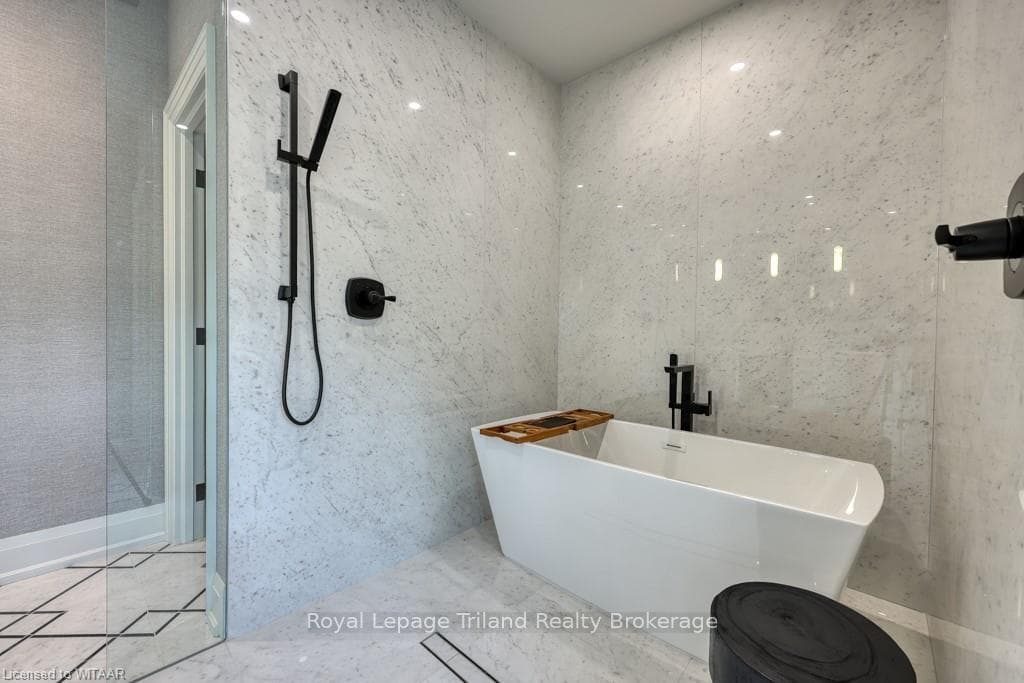 Relax and recharge in the soaker tub and over size