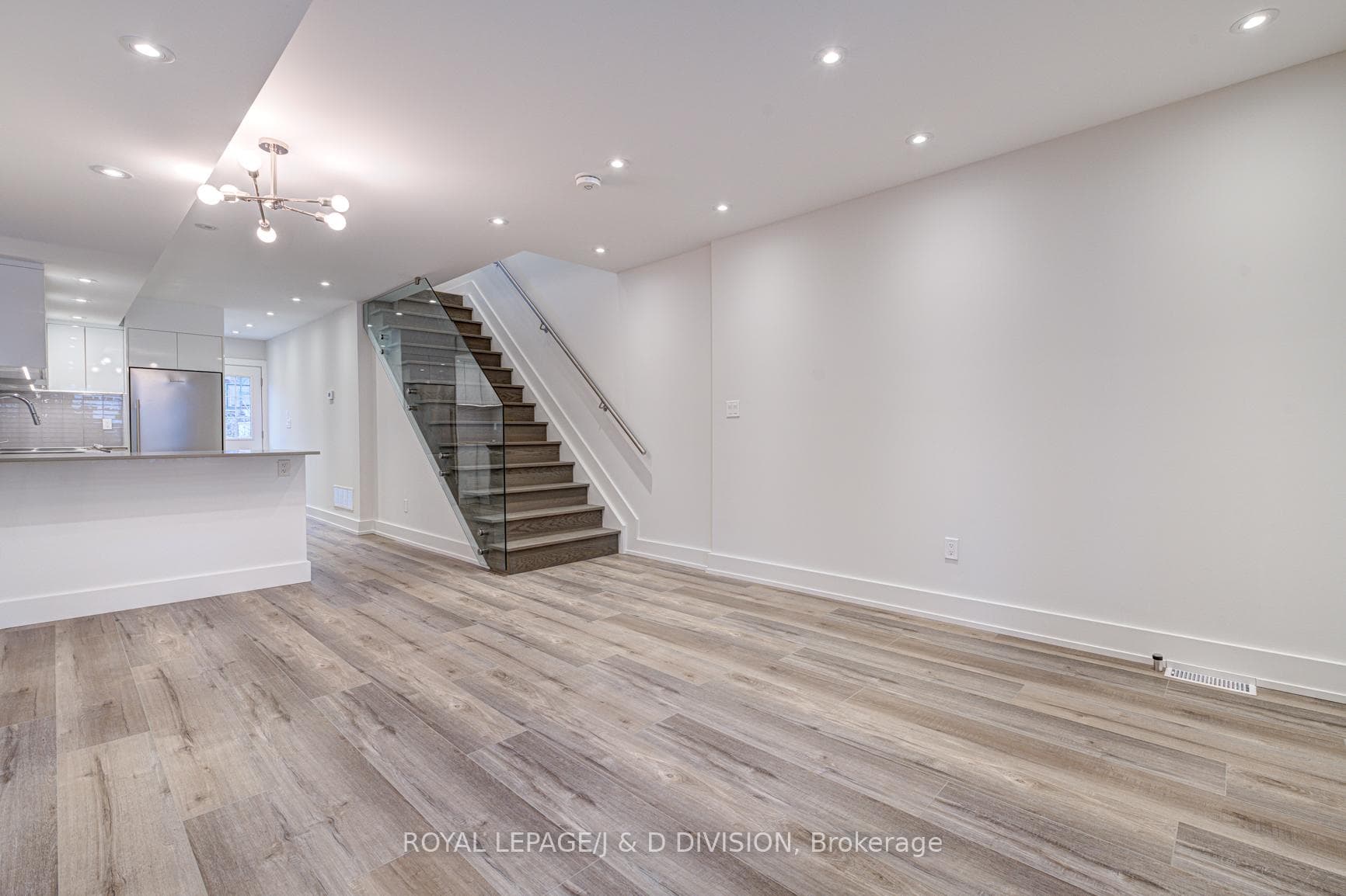 Stairs to Upper with Glass Railing