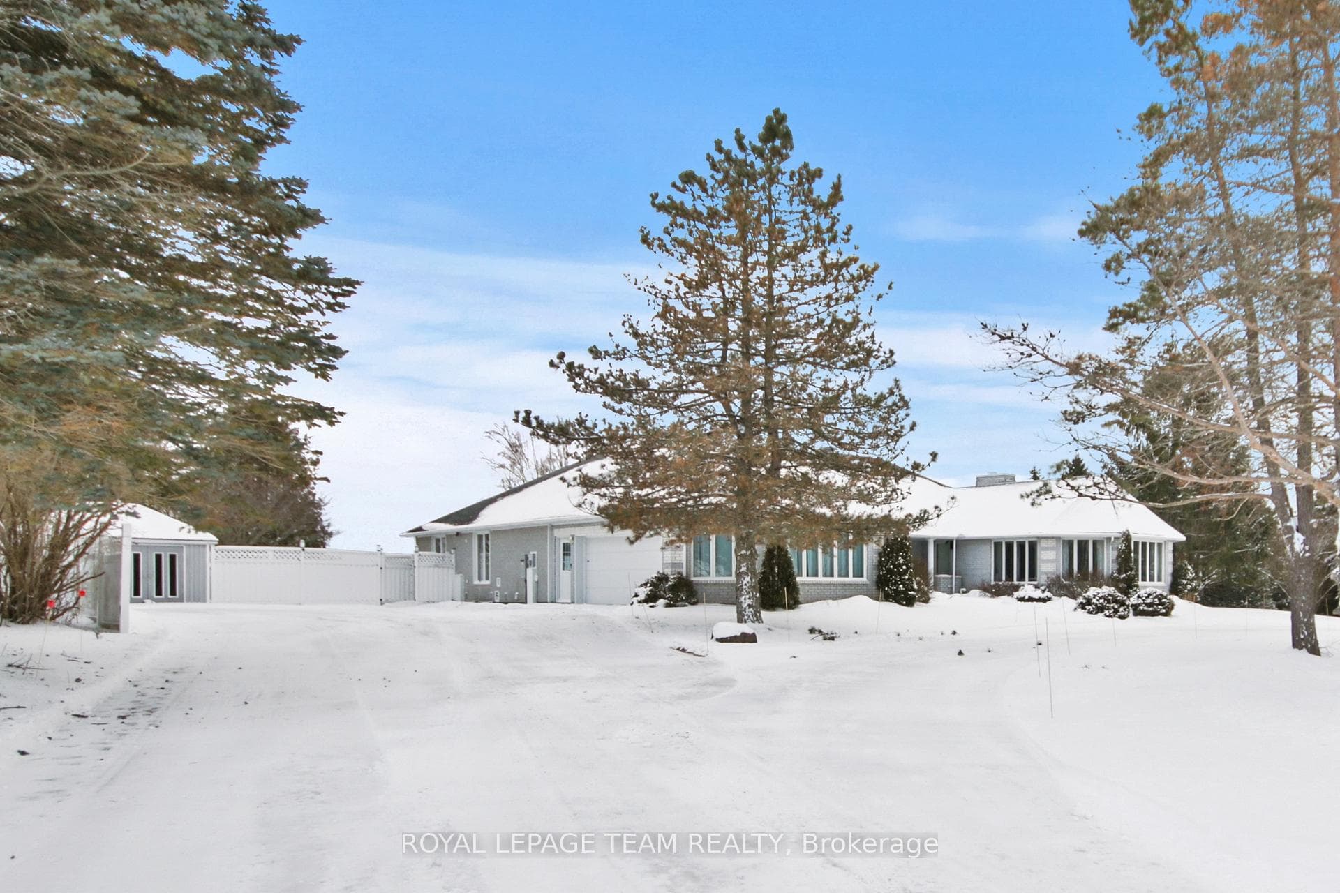 18 acre parcel with sprawling bungalow.