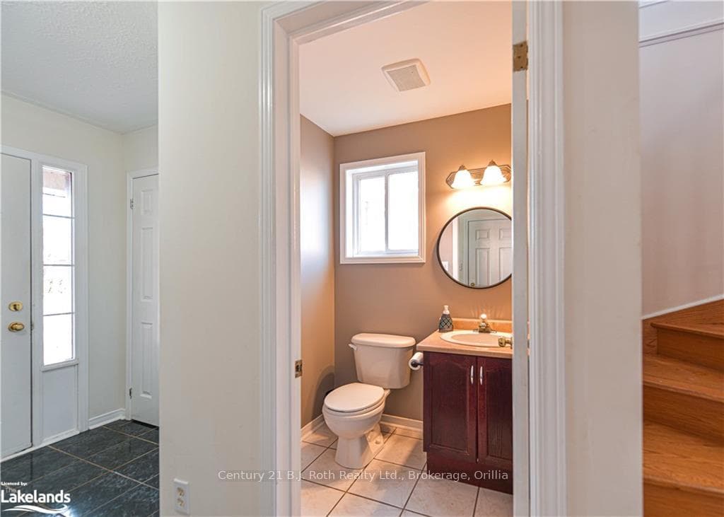 A convenient powder room just inside.