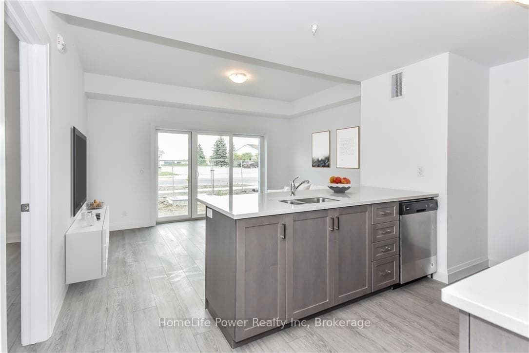 Kitchen open to Living Room (Virutally Staged)
