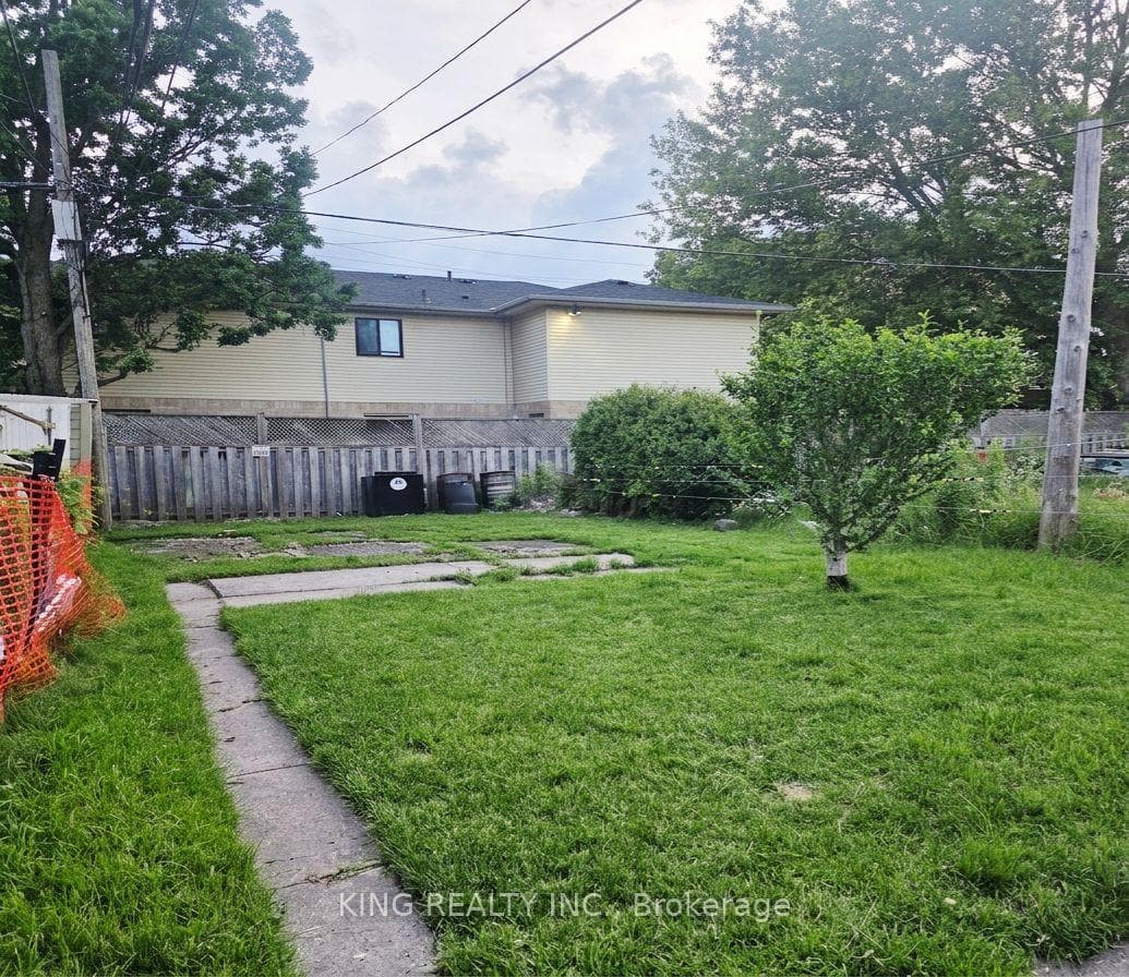 Parking Area and Backyard