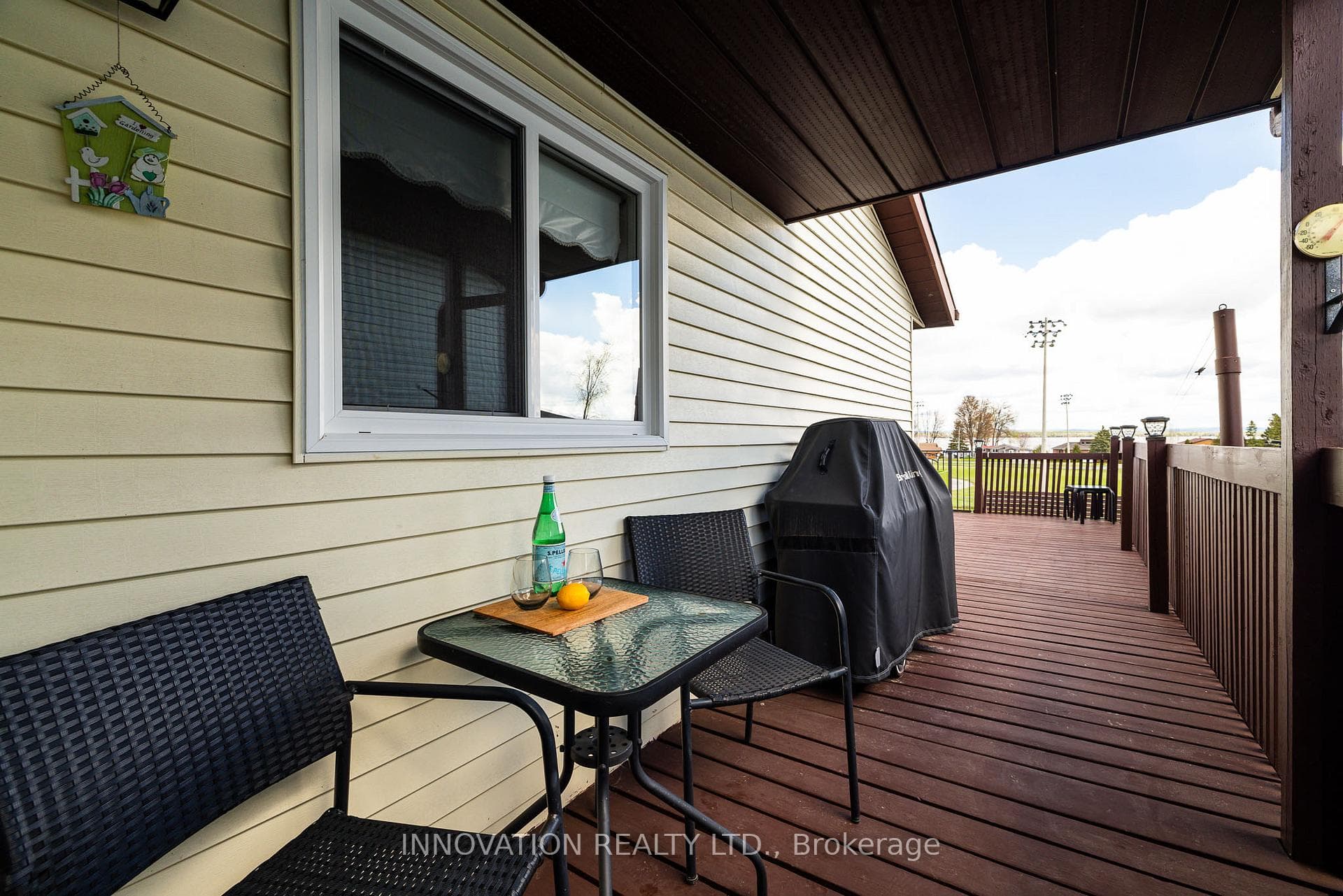 Wrap around deck with covered sitting area