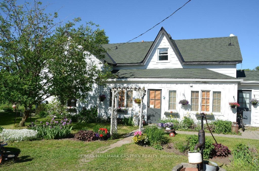 1-1/2 Storey Farmhouse with Enclosed Porch
