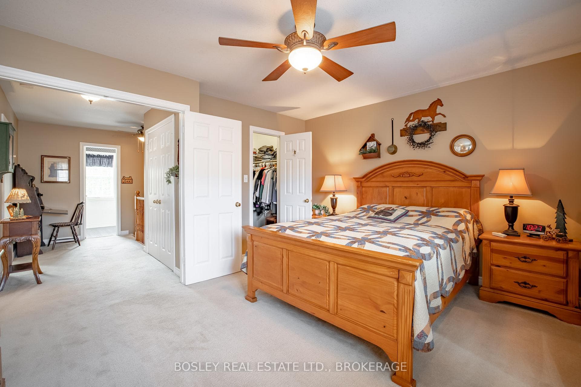 Large primary bedroom with ensuiye bathroom and wa