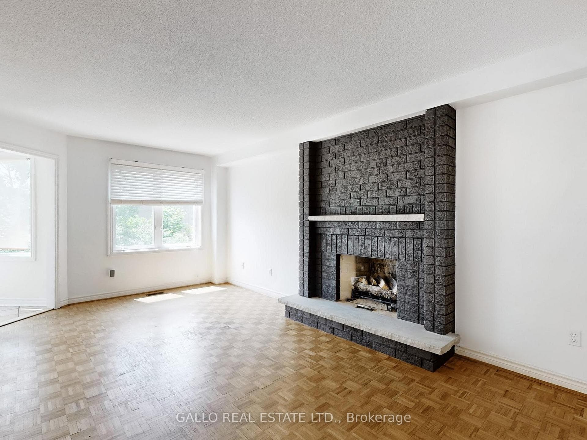 MAIN FLOOR FAMILY ROOM-WOOD FIREPLACE