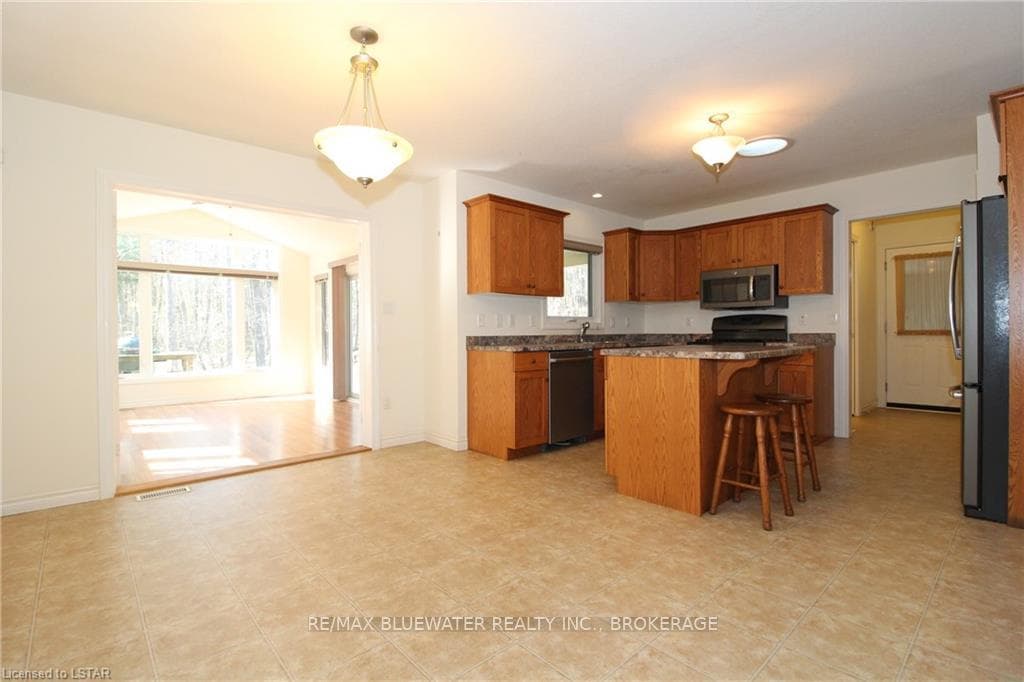 Kitchen with the sunroom to the left
