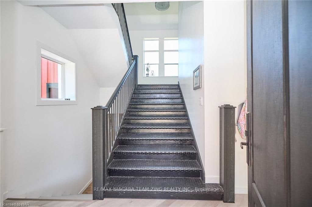 Original School stairs leading to Main Level